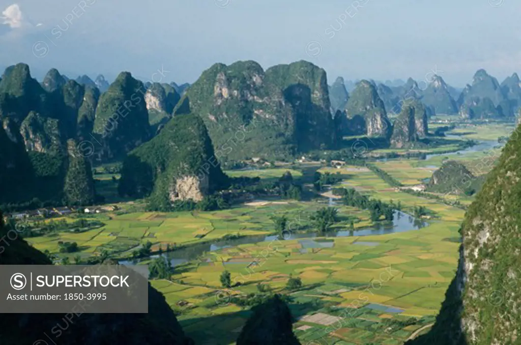 China, Guangxi, Near Guilin , View From Moonhill With Karst Limestone Formations Around The River Valley With Rice Paddies