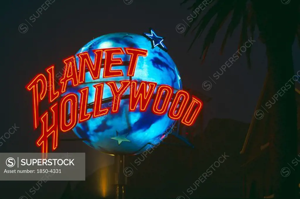 South Africa, Cape Town, 'V&A Waterfront, A Rotating 'Planet Hollywood' Logo Infront Of New Resturant Taken At Night.  '