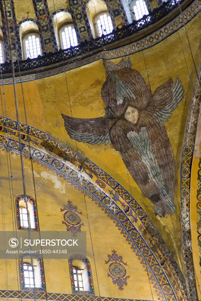Turkey,  Istanbul, Sultanahmet Haghia Sophia Mural of a six winged seraph or angel below the central dome.
