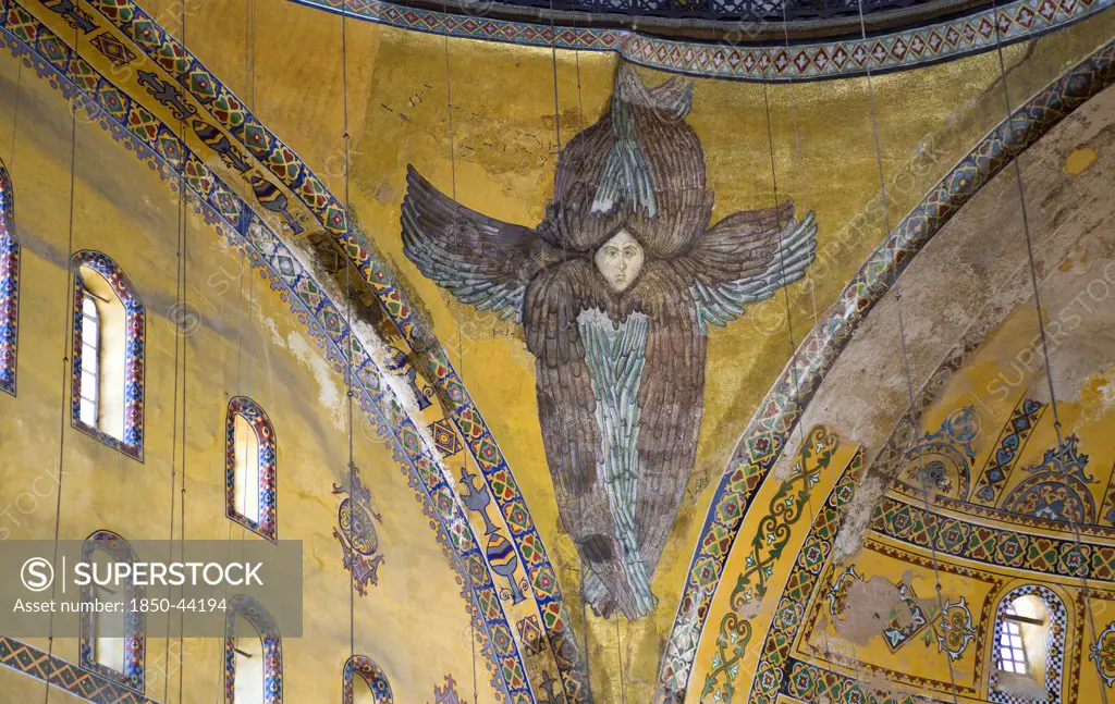 Turkey,  Istanbul, Sultanahmet Haghia Sophia Mural of a six winged seraph or angel below the central dome.