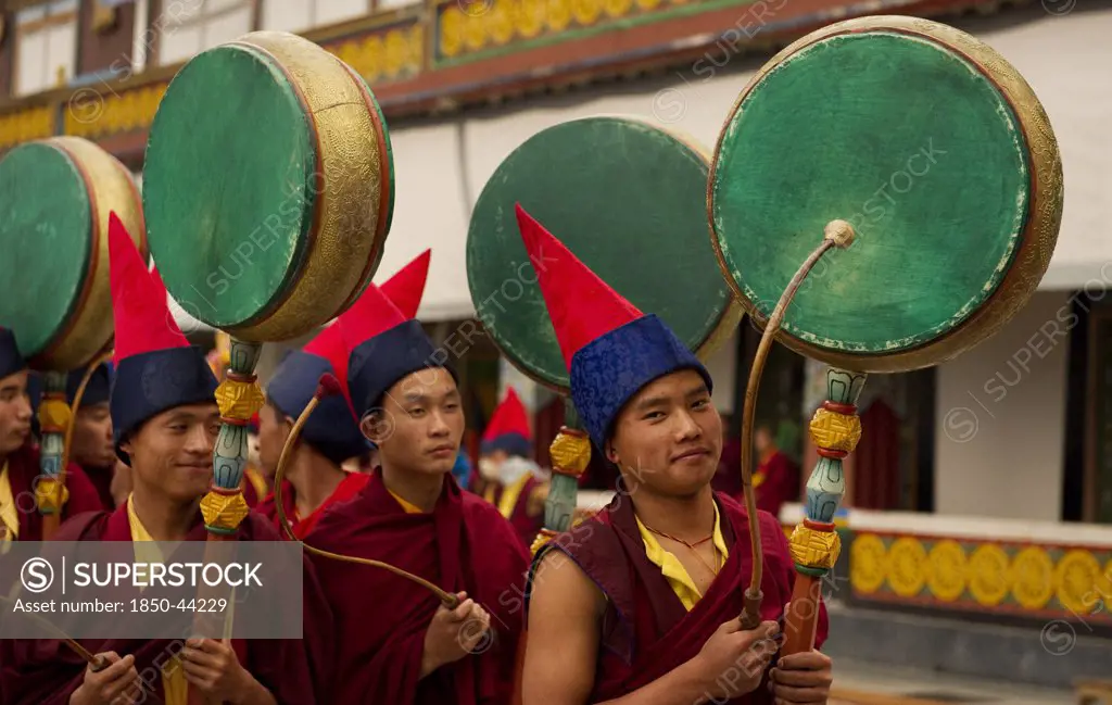 India,  Sikkim, Buddhist Monks playing drums in a Losar ceremony.