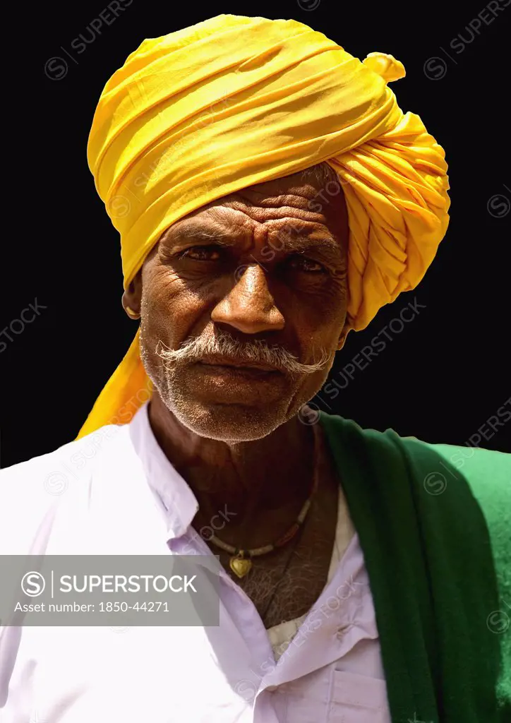 India, Karnataka, People, Lambani Gypsy Tribal man. Forest dwellers now settled in 30-home rural hamlets. Related to the Rabaris gypsies of Kutch Gujarat.