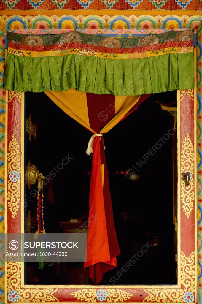 India,  Sikkim, Decorated door in Buddhist monastery.