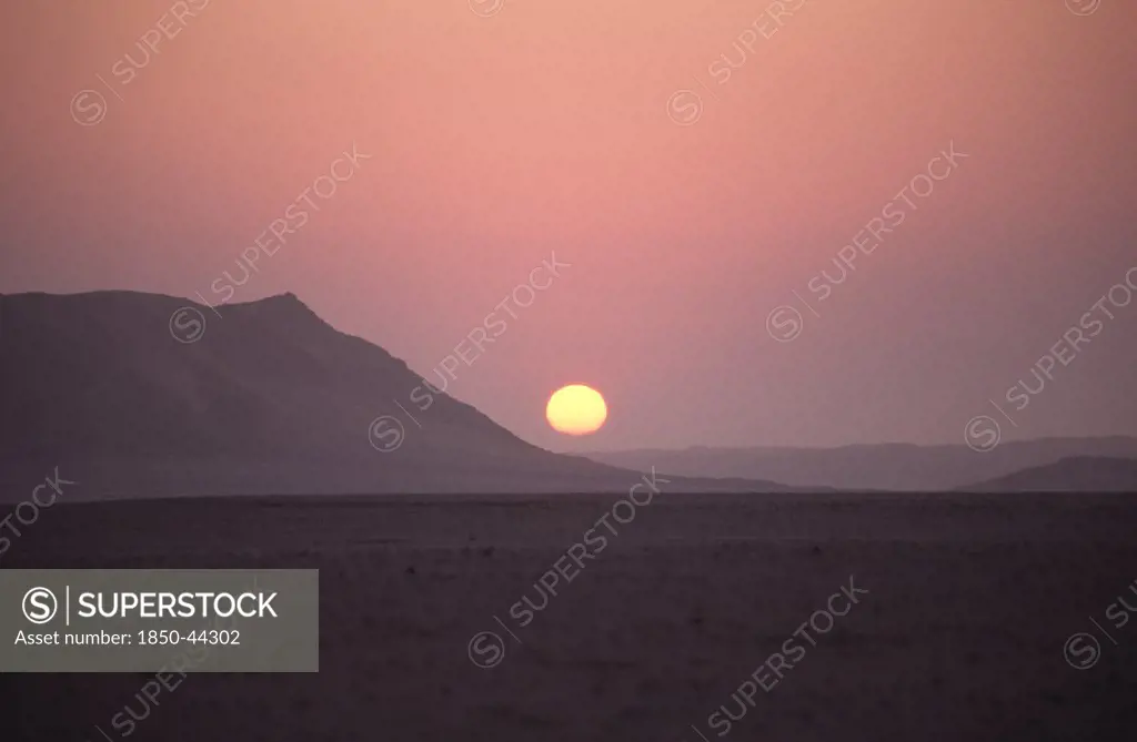 Namibia,  Namib Naukluft National Park, Sunset in the Namib Naukluft desert. Access is restricted due to Diamond mining activity by DeBeers.