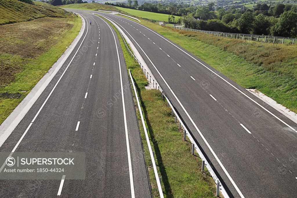 Ireland, County Tyrone, Ballygalley, View over dual empty dual carriageway.