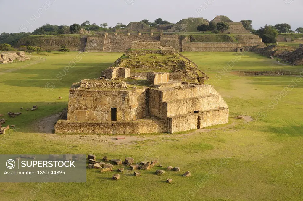 Archaeological site Ruins of Monticulo J and Edifio I H and G buildings in the central plaza.Mexico Oaxaca Monte Alban