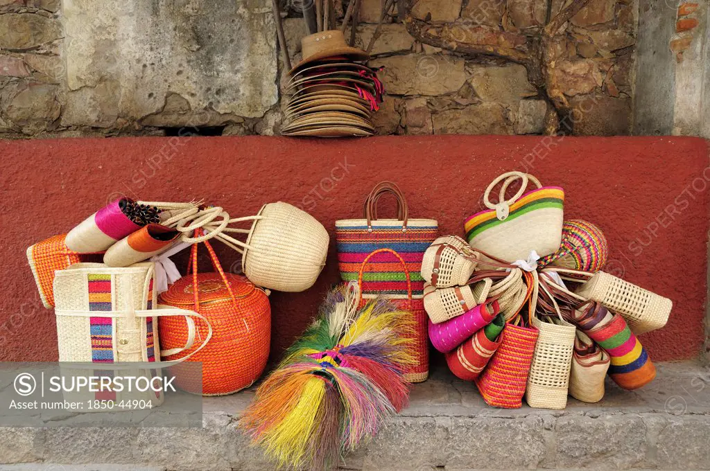 Colourful straw baskets for sale in the market, Mexico Bajio San Miguel De Allende
