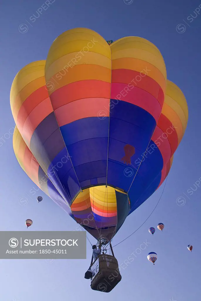 Annual balloon fiesta colourful hot air balloons ascending. , USA New Mexico Albuquerque