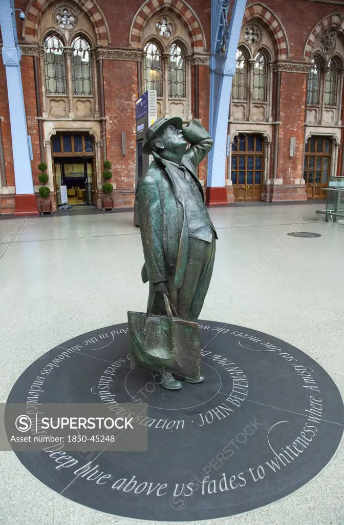 St Pancras railway station on Euston Road Statue of Sir John Betjeman.England London