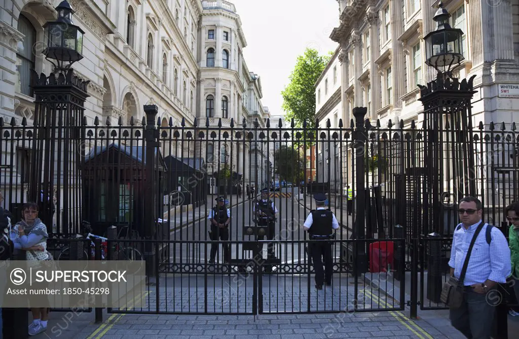 Westminster Whitehall Downing Street Security gates and armed police guards, England London