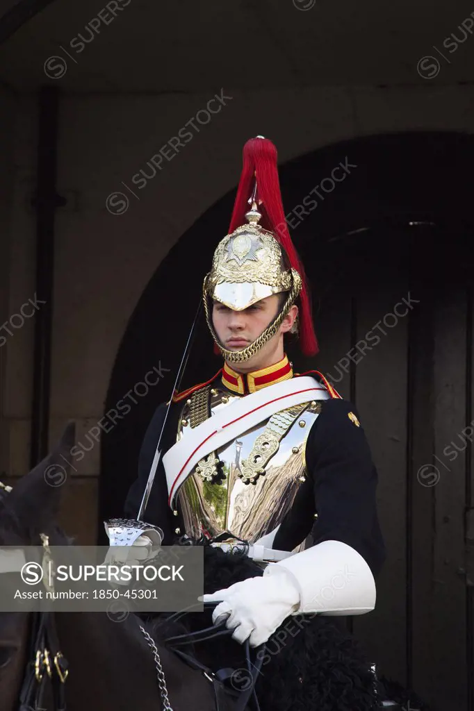 Westminster Whitehall Horse Guards Parade member of the Household Cavalry on horseback.England London