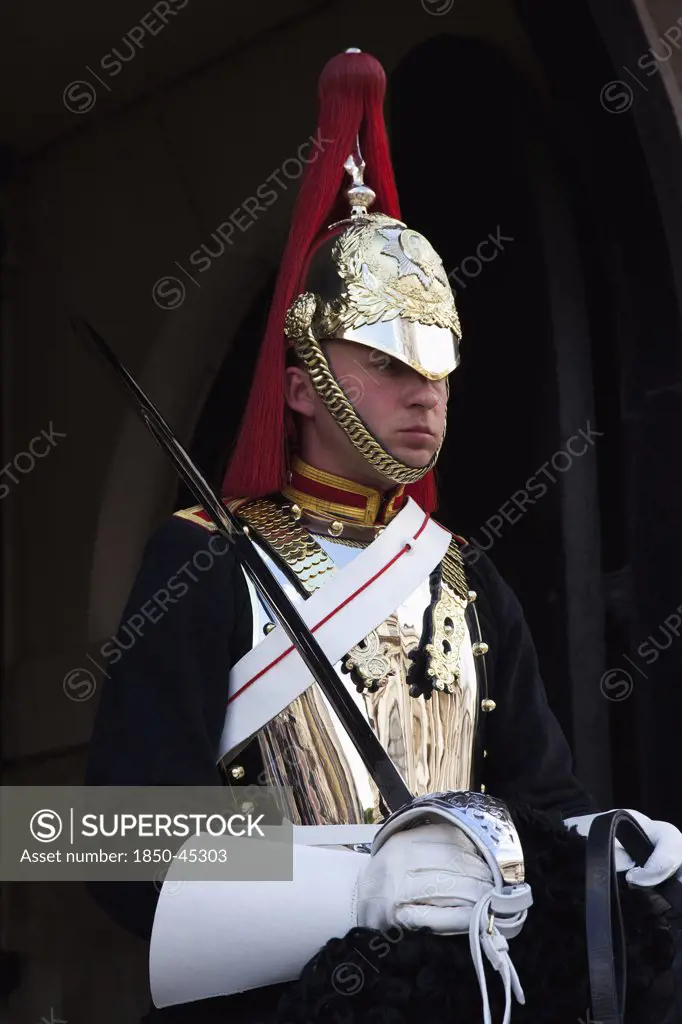 Westminster Whitehall Horse Guards Parade member of the Household Cavalry on horseback.England London
