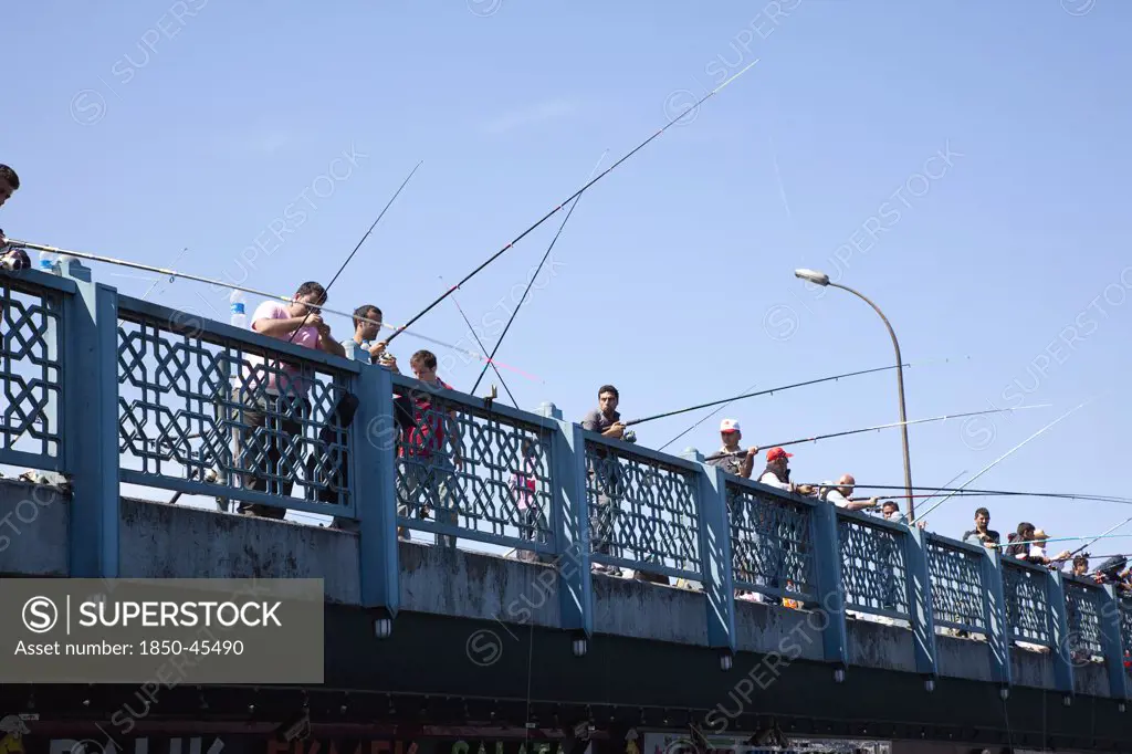 Galata Bridge people fishing.Turkey Istanbul