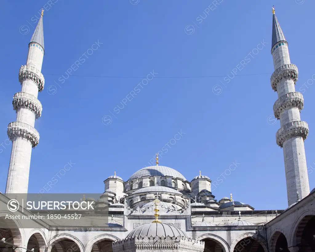 Eminonu Yeni Camii New Mosque Domed roof and Minarets.Turkey Istanbul