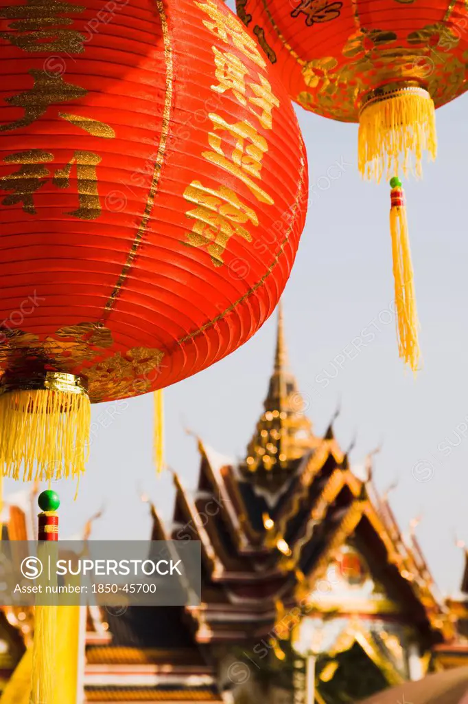 Thailand, Bangkok, Wat Yannawa temple roof and  red lantern at Chinese New Year.
