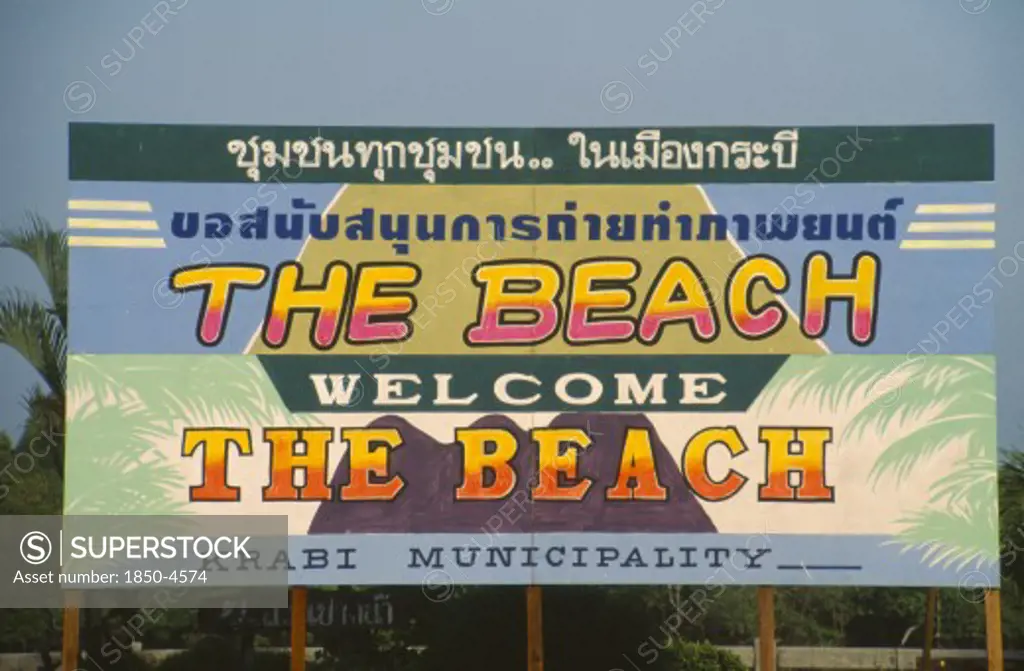 Thailand, Krabi, Hoarding In Krabi Town With Poster Welcoming The Makers Of The Film The Beach.