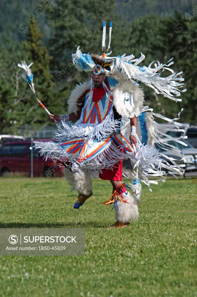 Canada, Alberta, Waterton Lakes National Park, Blackfoot dancer in the Fancy Dance at the Blackfoot Arts & Heritage Festival Pow Wow organized by Parks Canada and the Blackfoot Canadian Cultural Society at this UNESCO World Heritage Site.