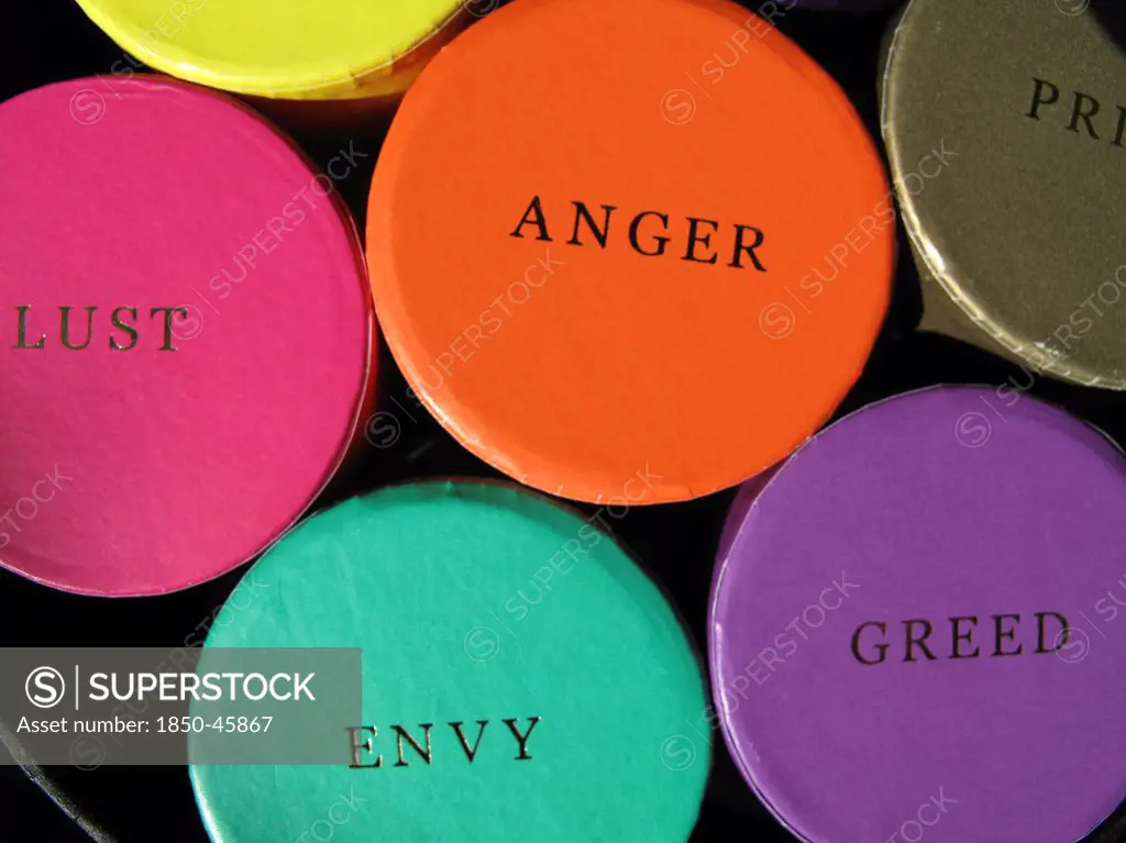 England, West Sussex, Chichester, Colourful trinket boxes on a market displaying the words of the Seven Deadly Sins.