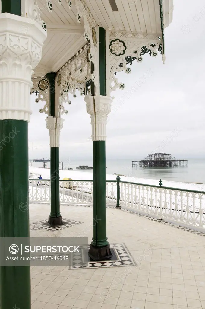 England, East Sussex, Brighton, West Pier ruin photographed from the Bedford square bandstand, known locally as the Birdcage.