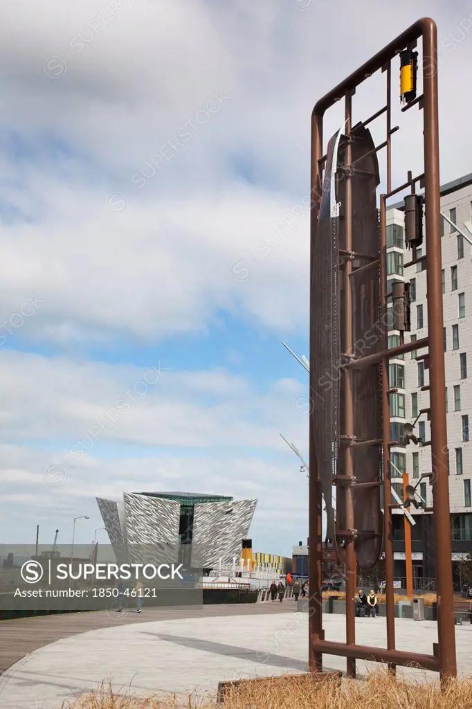 Ireland, North, Belfast, Titanic Quarter, Visitor centre designed by Civic Arts & Eric R Kuhne, with model making toy sculpture in the foreground.