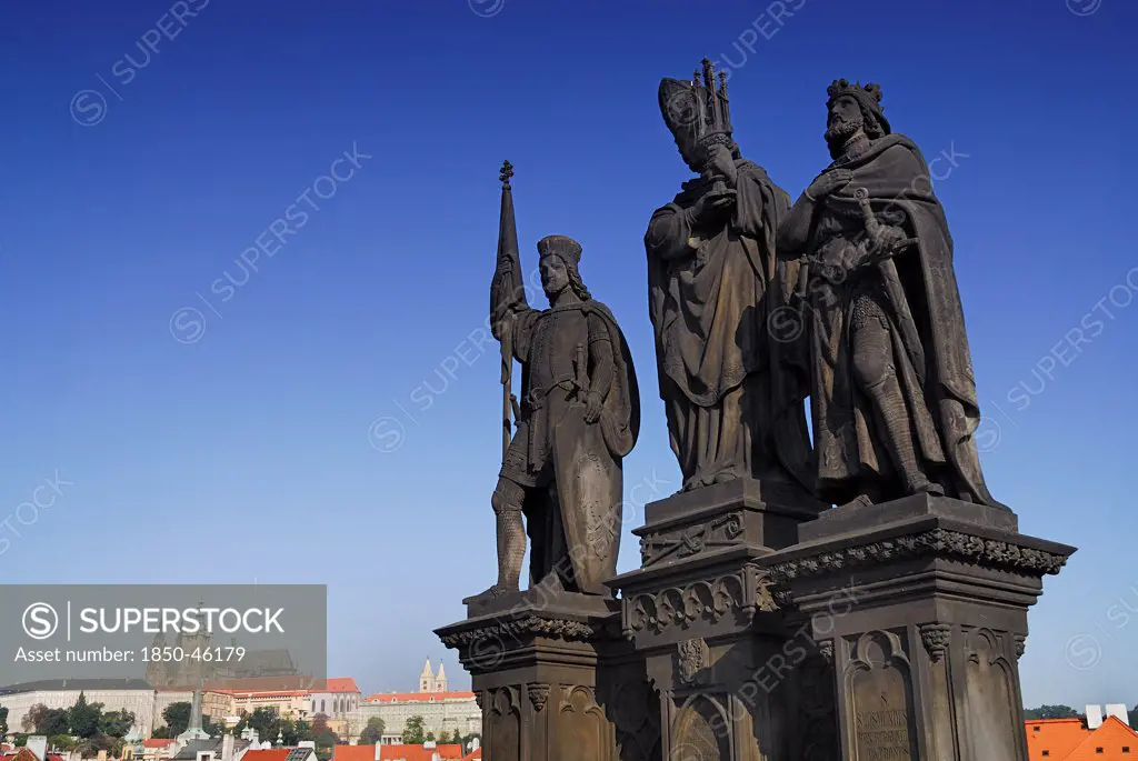 Czech Republic, Bohemia, Prague, Charles Bridge, Statue of Saints Norbert of Xanten, Wenceslas and Sigismund.