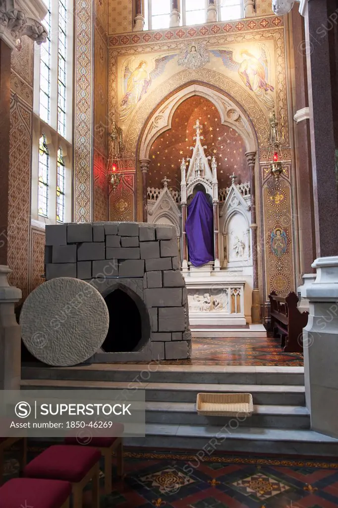 Ireland, North, Belfast, Falls Road, Clonard Monastery interior decorated for Good Friday with statues draped in purple cloth.