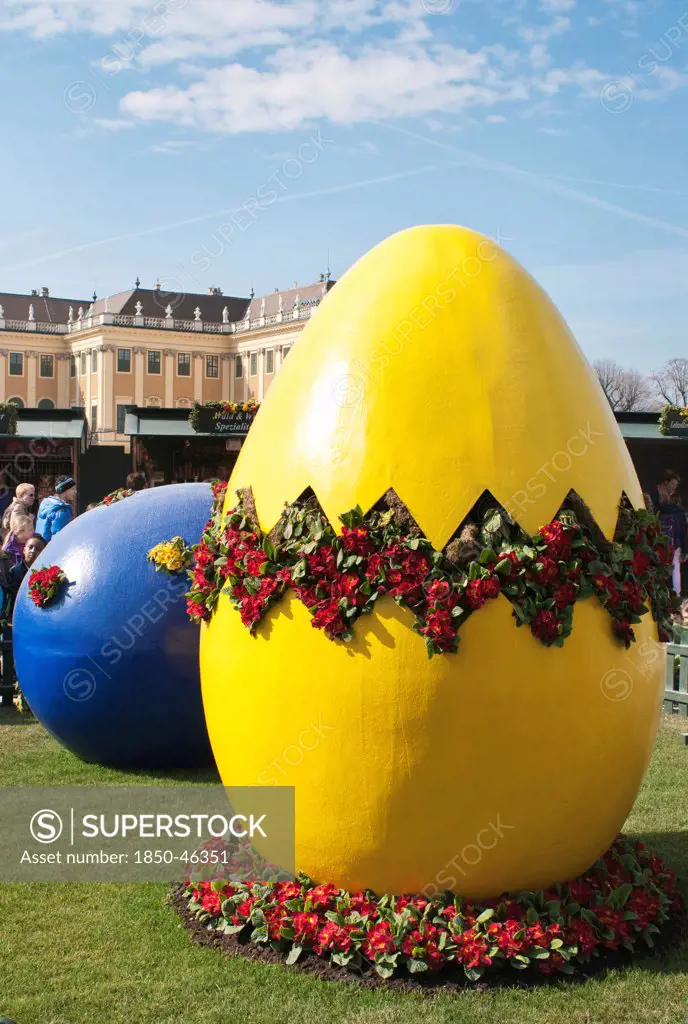 Austria, Vienna, Giant painted Easter eggs at entrance of the Easter Market at the Schonbrunn Palace.