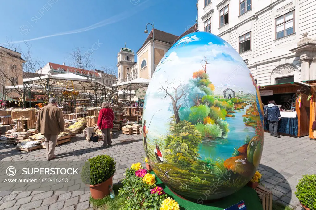 Austria, Vienna, A giant painted egg marks the entrance to the Old Vienna Easter Market at the Freyung.