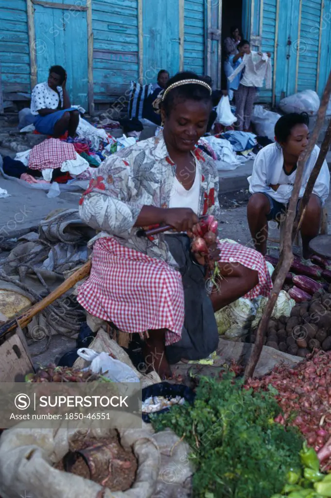 Dominican Republic, Markets, Vegetable stall holder in market.
