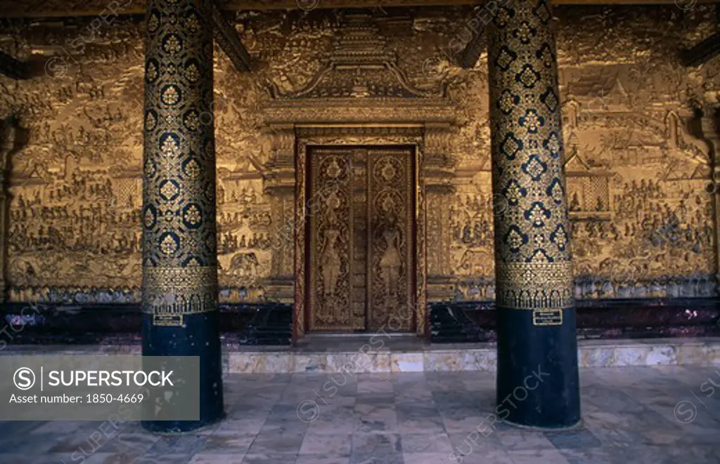 Laos, Luang Prabang, Wat Mai Suwamaphumaham. Ornate Gold Doorway