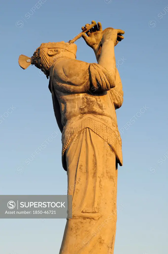 Mexico, Veracruz, Papantla, Statue of Volador de Papantla dancer.