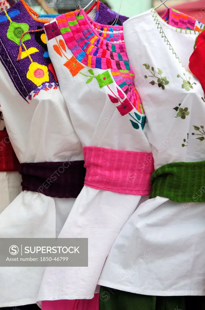Mexico, Oaxaca, Hand embroidered blouses for sale.