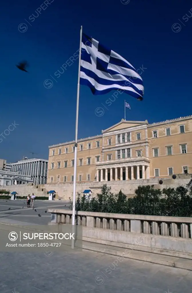 Greece, Athens , Parliament Building And Greek Flag In The Foreground