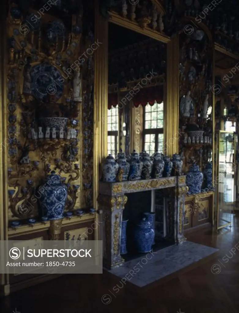 Germany,  , Berlin, Charlottenburg Palace Interior With Gold Mirror Above Fireplace And