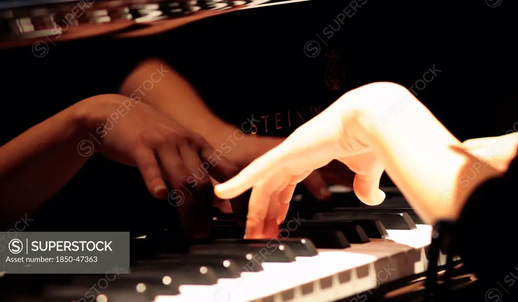 Music, Instruments, Keyboards, Piano Close of of musicians hands playing Steinway.