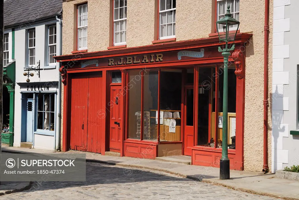 Ireland, County Tyrone, Omagh, Ulster American Folk Park 19th century street Blair stationers shopfront.