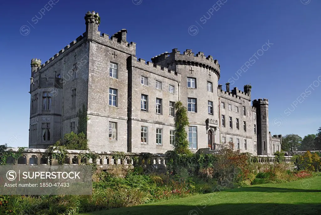 Ireland, County Sligo, Markree, Castle hotel angular view of the castle with section of the gardens in foreground.