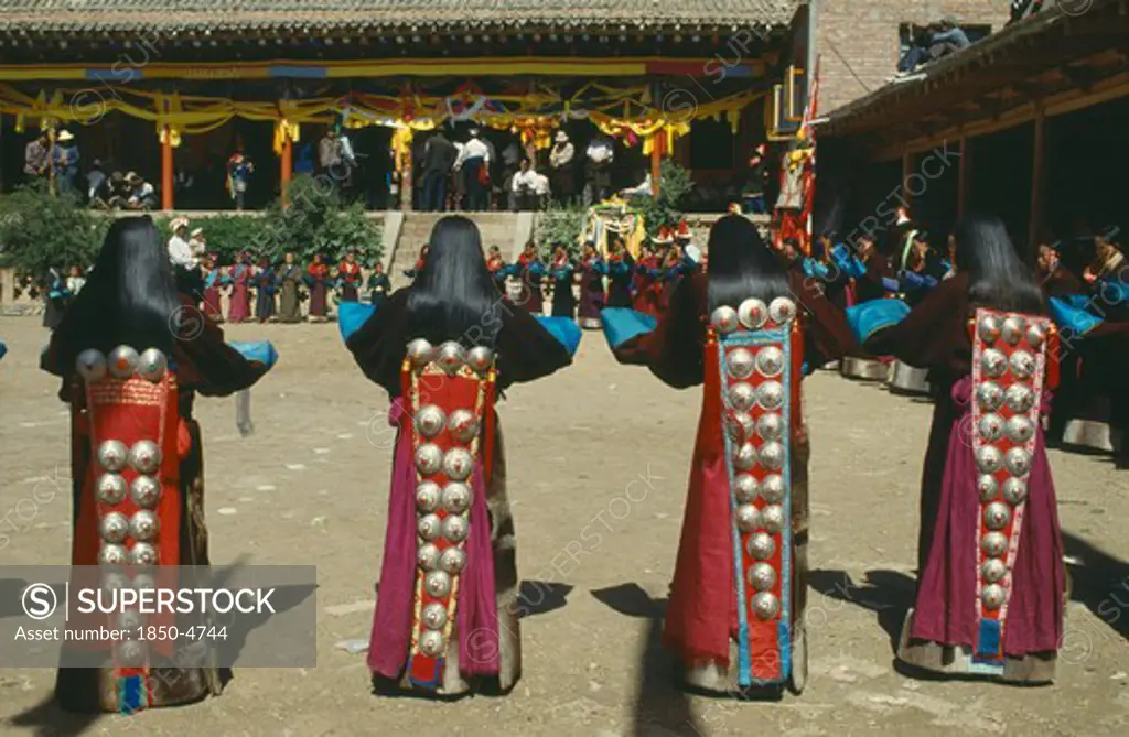 China, Guizhou, Tongren , Tibetan Festival. Girls Dancing At Monastery