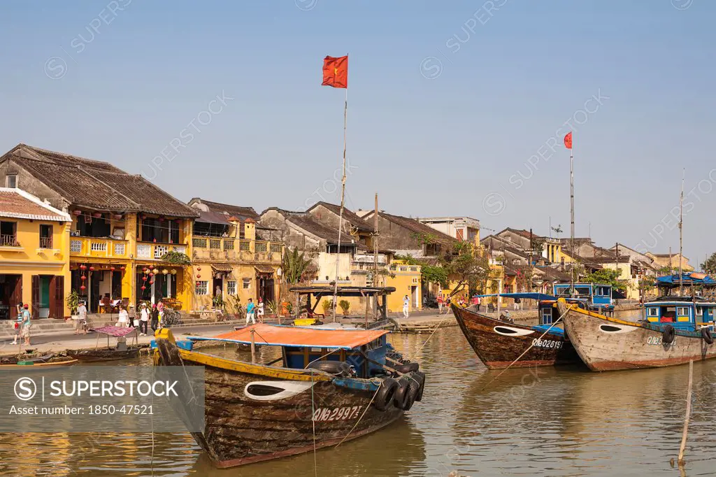 Vietnam, Quang Nam Province, Hoi An, Fishing boats moored on the Thu Bon River.