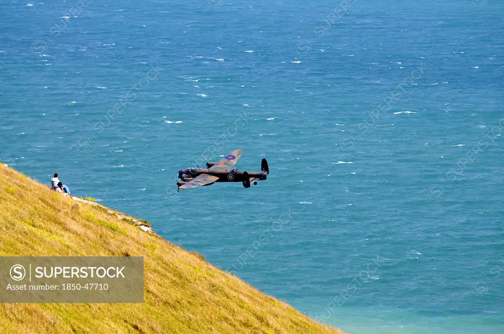 England, East Sussex, Beachy Head, Lancaster bomber taking part in the Airbourne air show.