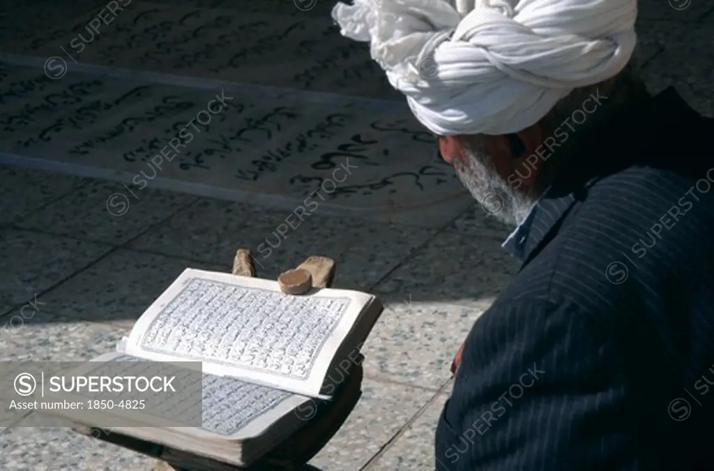 Iran,   , Yazd, Man Reading Koran