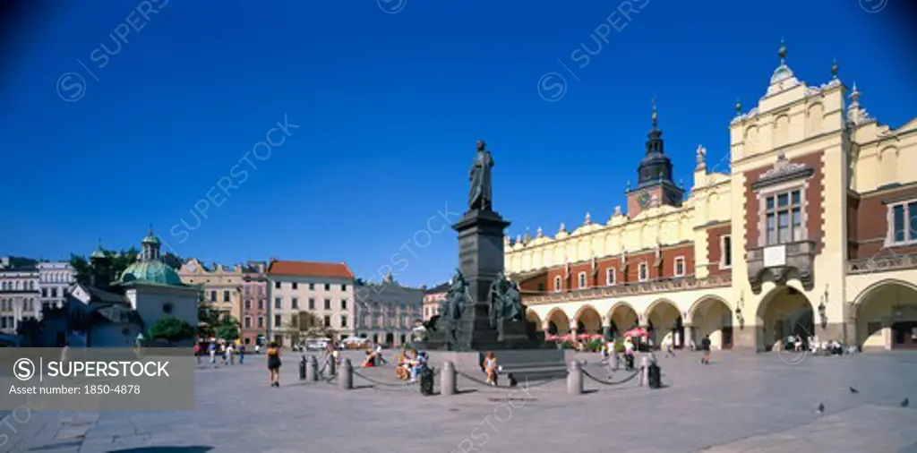 Poland, Krakow , View Across Rynek Glowny Or Grand Square And The Sixteenth Century Renaissance Cloth Hall Covered Market.