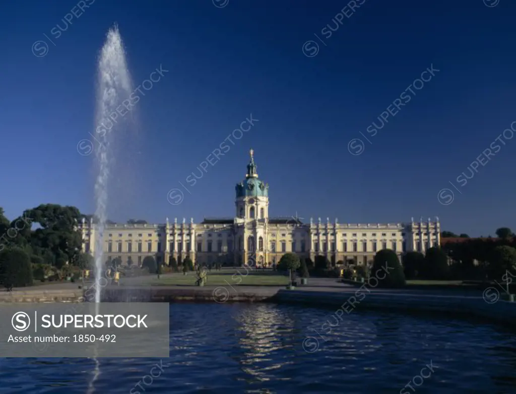 Germany, Berlin, Charlottenburg Palace. View Over Fountain And Pond In The Rear Gardens