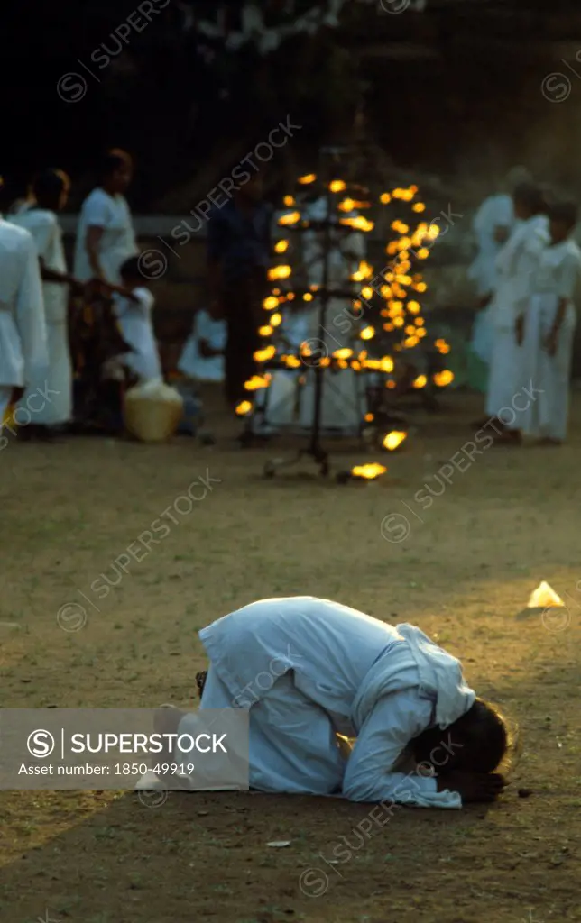 Sri Lanka, Anuradhapura, Prayers at the Sacred Bo Tree Ficus religiosa during Posen Festival celebrating introduction of Buddhism to Sri Lanka.