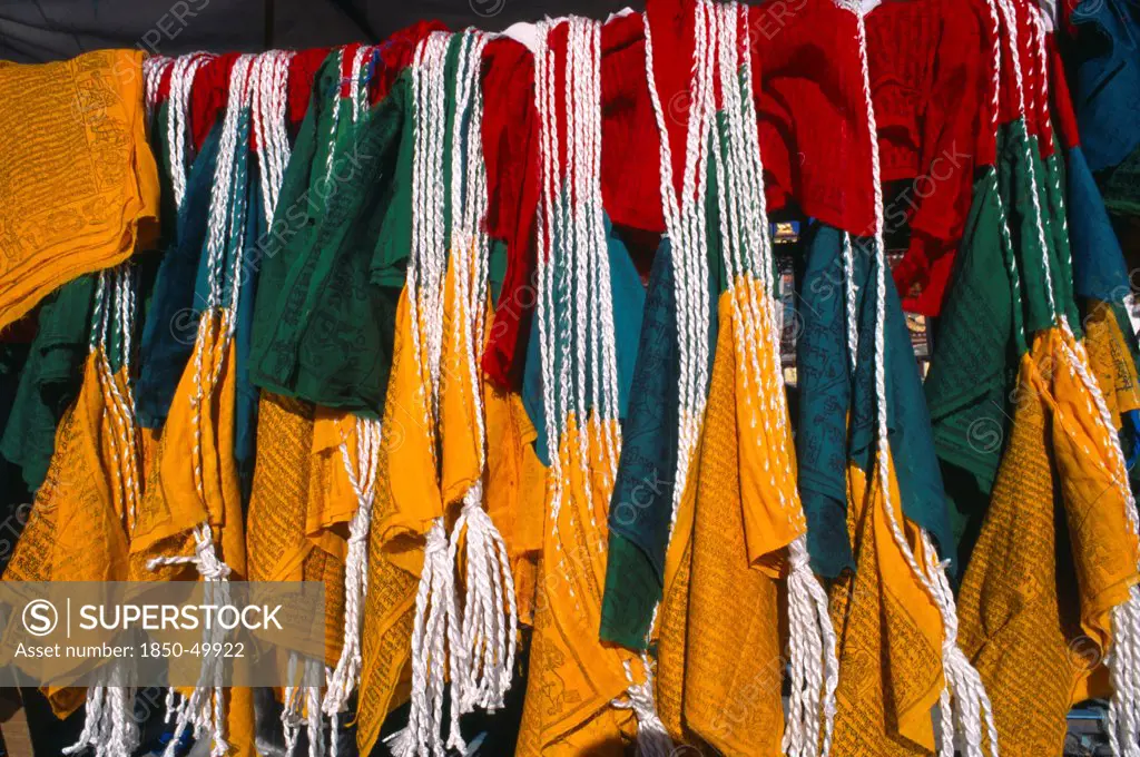 China, Tibet, Lhasa, Barkhor square red green and yellow Prayer flags.