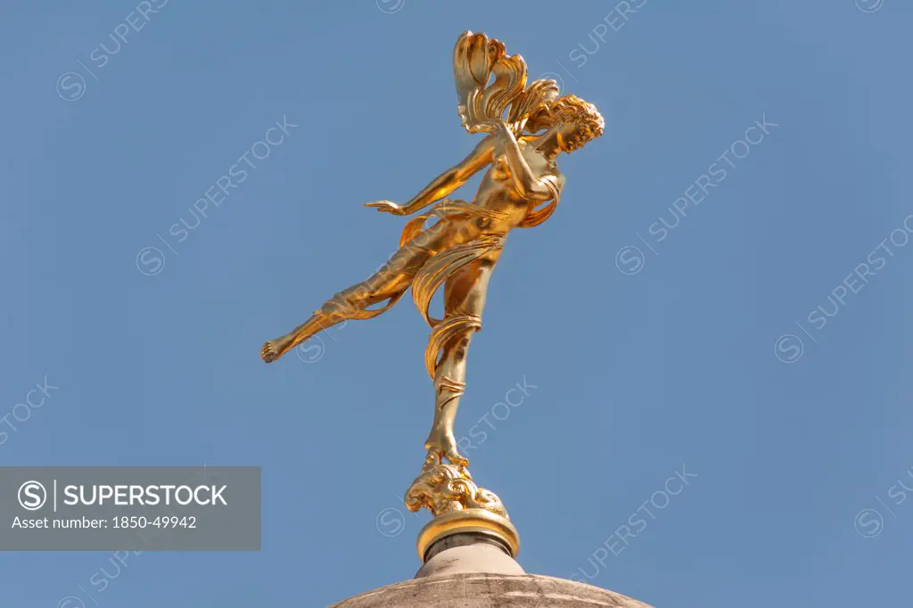 England, London, Golden statue of Shakespeares Ariel on a dome of the Bank of England.