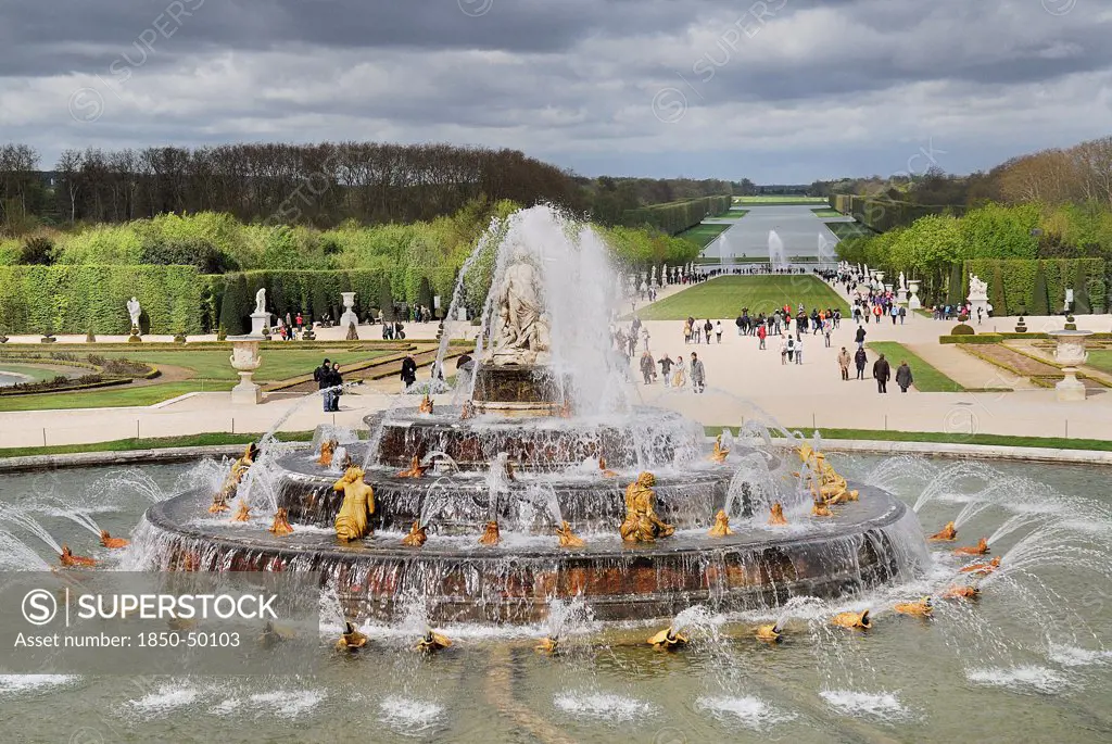 France, Ile de France, Paris, Versailles Latona Fountain and view of the gardens.