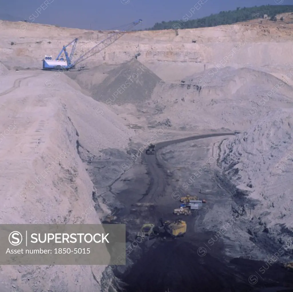 Turkey, Yatagan, 'Opencast Coal Mine, Deep Quarry, Loaded Trucks, Working Crane '