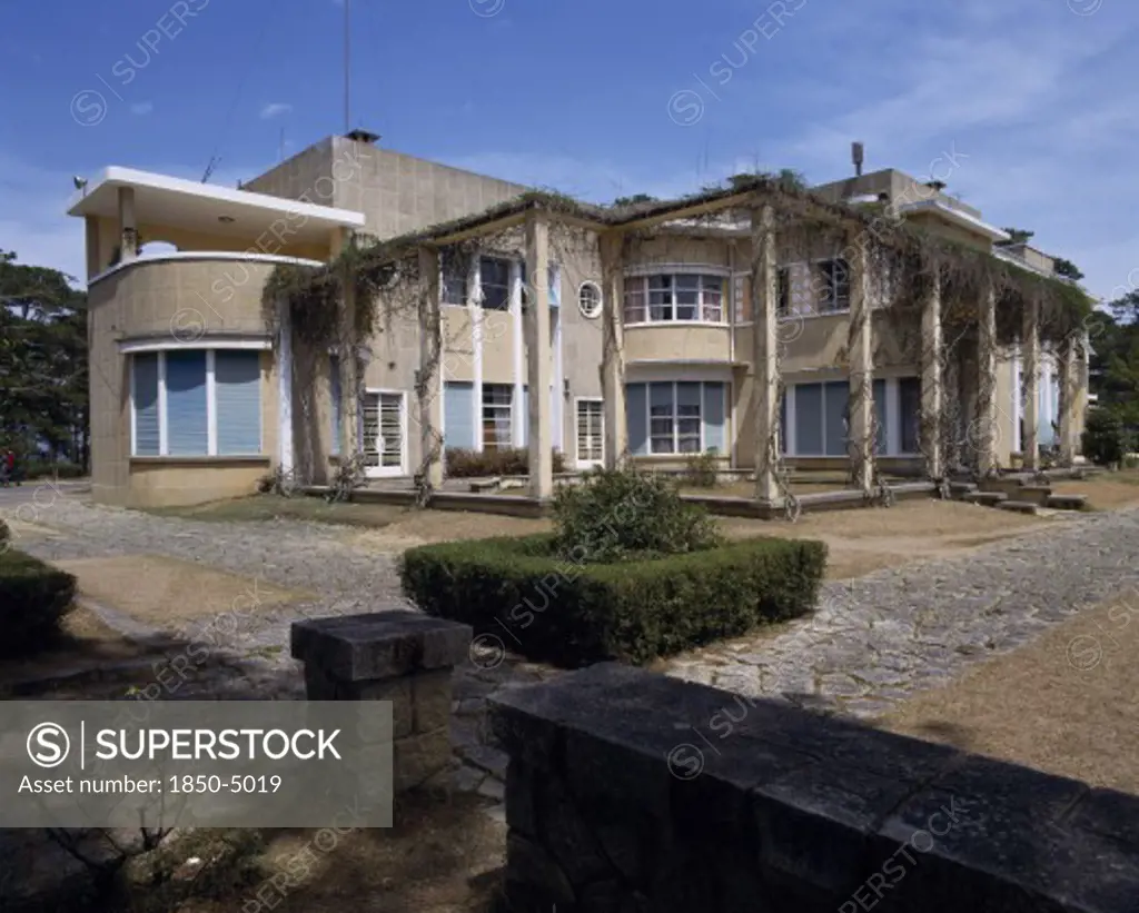 Vietnam, Dalat, Bao Dai'S Summer Palace. Flat Roof With Climbers On Pillars And Boxed Hedge