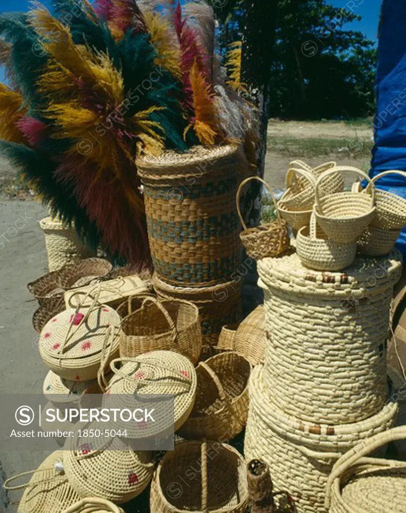 West Indies , Puerto Rico, San Juan, Display Of Wicker Baskets And Coloured Pampas Grasses